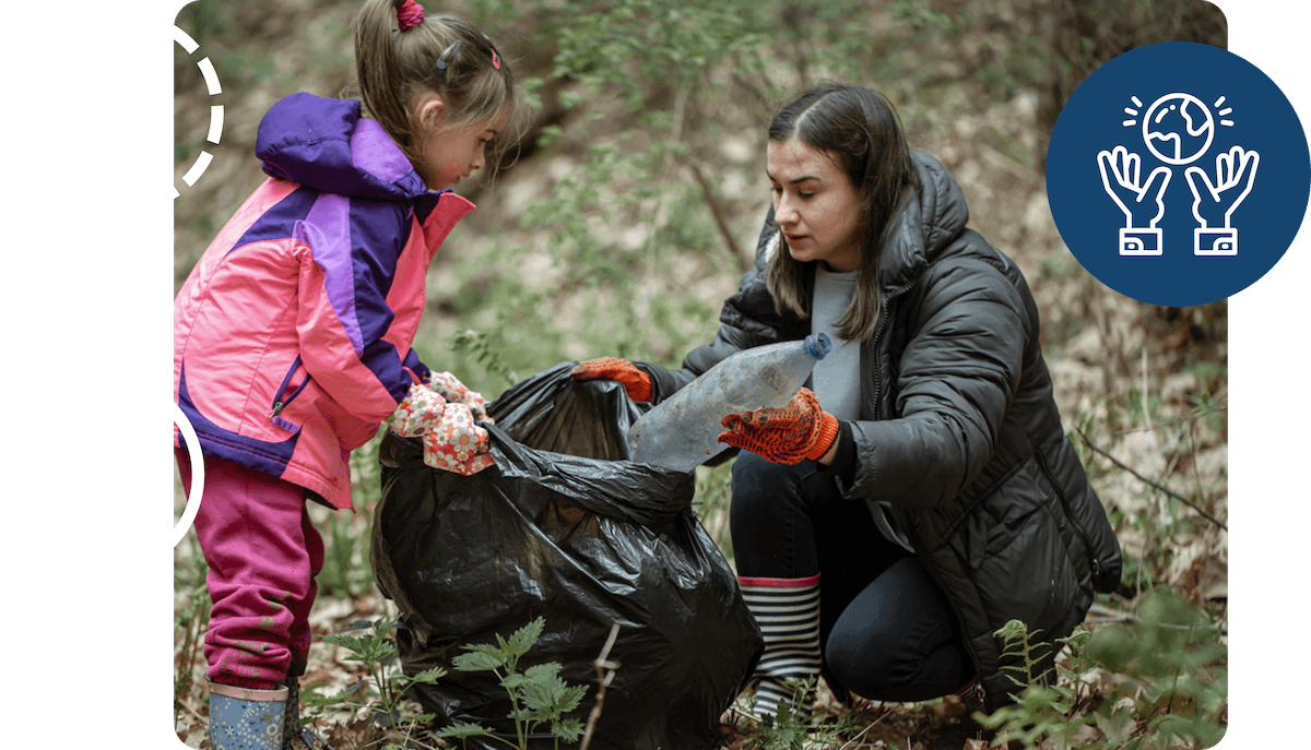 A lady and little girl picking up litter